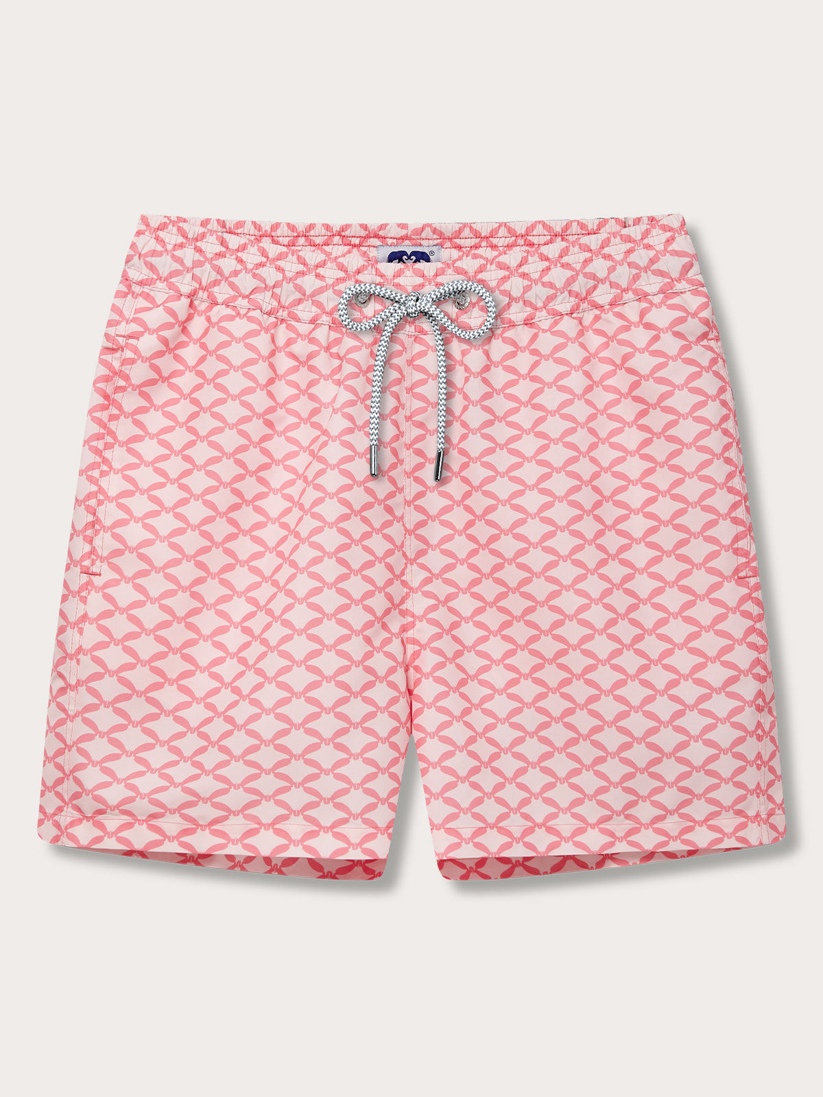 Ray Rhythm Staniel Mens Swim Shorts front. Patterned swim shorts featuring light pink manta rays on a dark pink background.