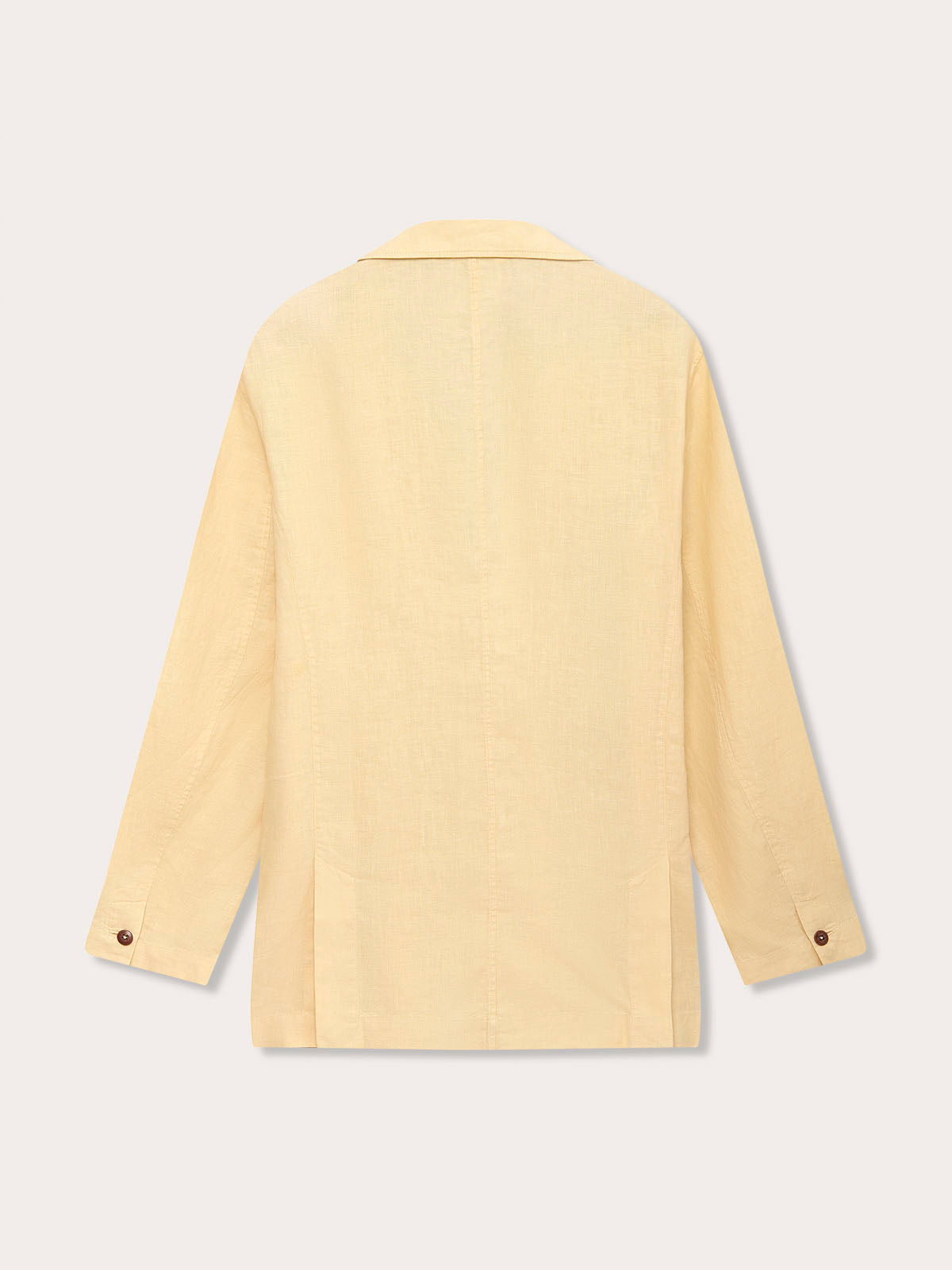 Men's Stone Nassau Linen Jacket rear view. Men's linen jacket showcasing lightweight, unstructured design and corozo nut button cuffs.