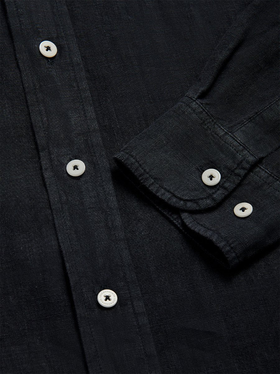 Close-up of the buttons and fabric texture of the Men's Volcanic Black Abaco Linen Shirt. Old money shirts crafted from 100% linen.