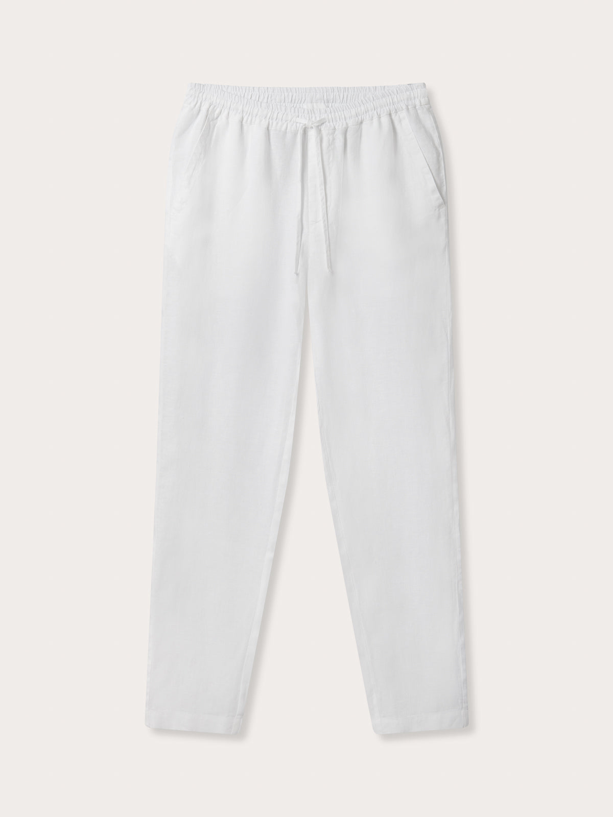Front view of Men's White Eleuthera Linen Trousers. Classic white linen pants for men with drawstring waist and 2 handy pockets.