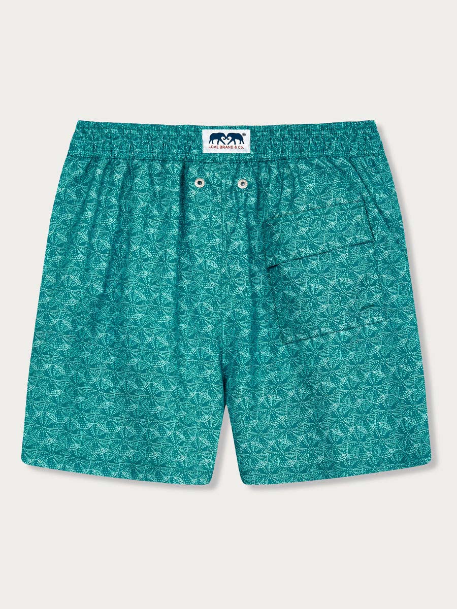 Men's Searching for Urchin Staniel Swim Shorts with a sea urchin motif. Patterned swim shorts made from 100% recycled quick-dry fabric in a vibrant teal pattern.