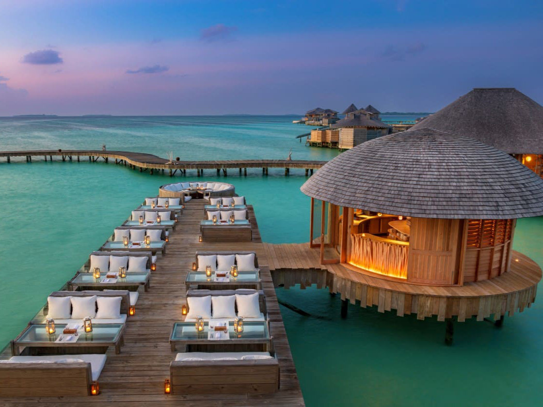 dining area over the waters of The Maldives at Soneva Jani