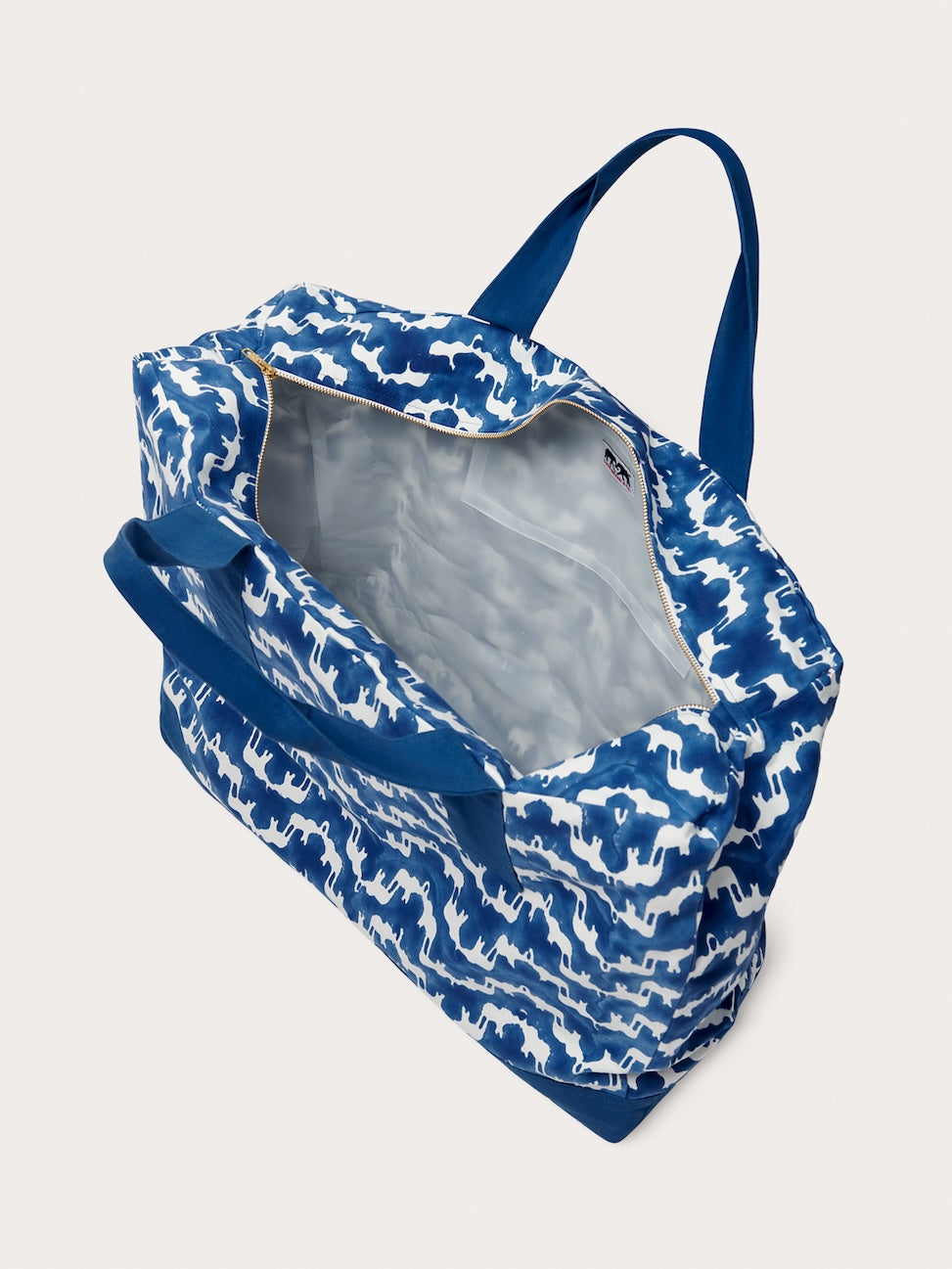 Open beach tote bag in a blue and white pattern print