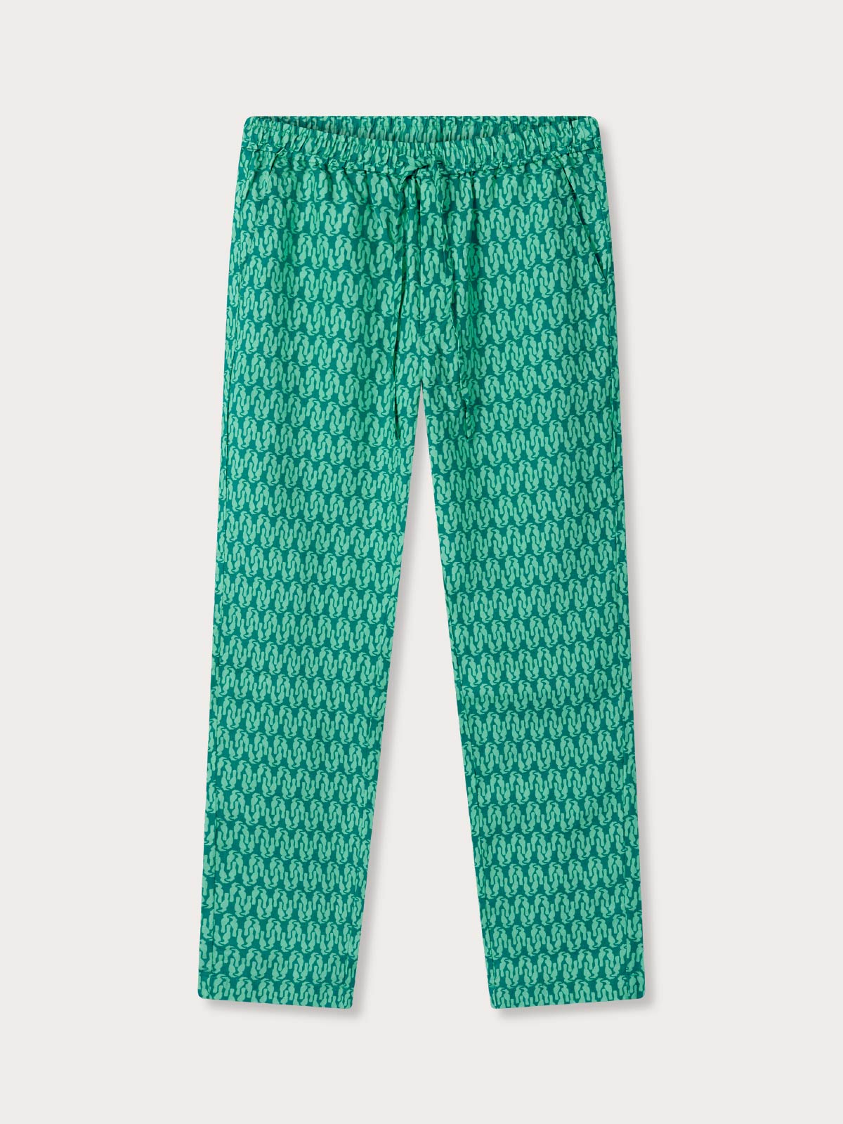 Green patterned pants on a light gray background