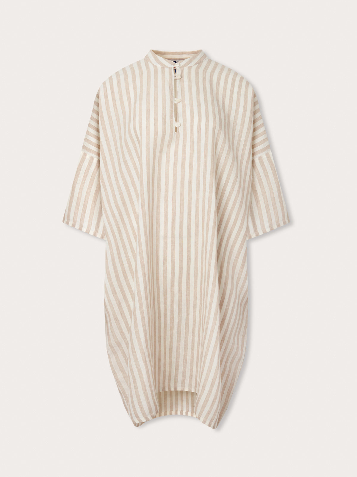 Womens Coconut Stripe Jumento Linen Poncho front view. brown and white striped pattern on short sleeved, half-button up shirt dress poncho.