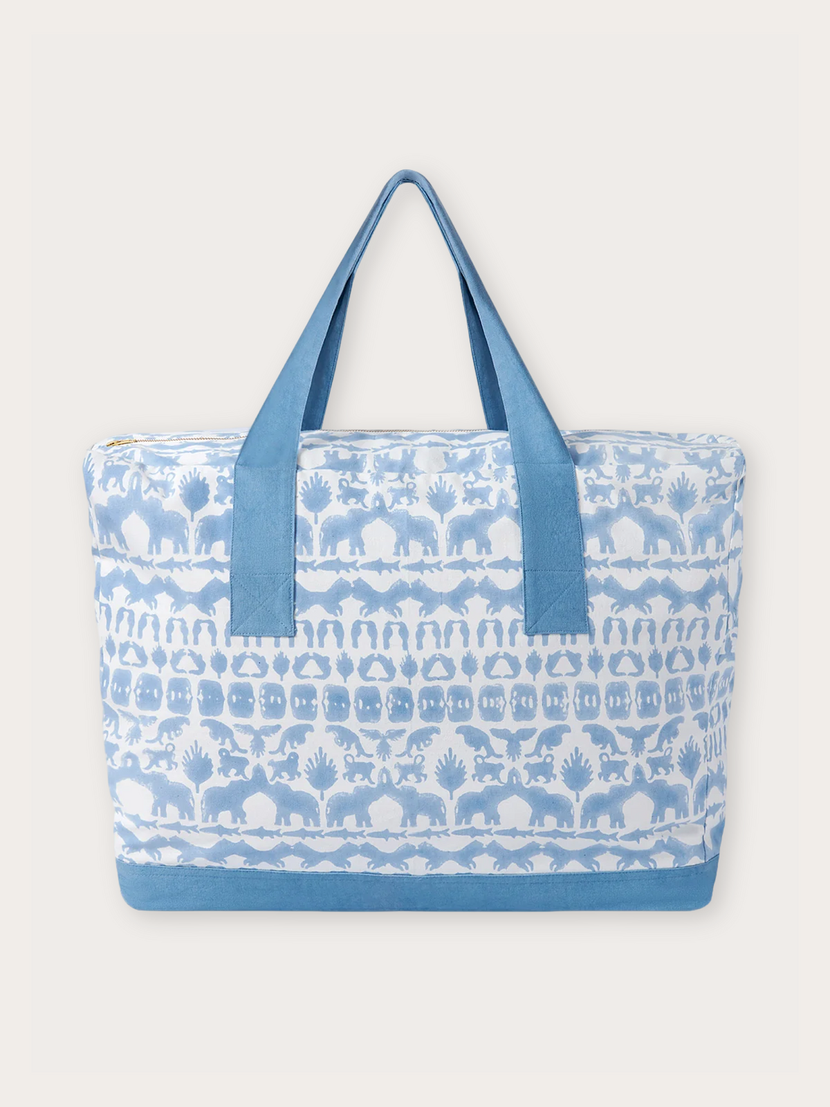 A tote bag with a white base and light blue horizontal patterned bands featuring animal silhouettes, finished with solid light blue handles and bottom trim
