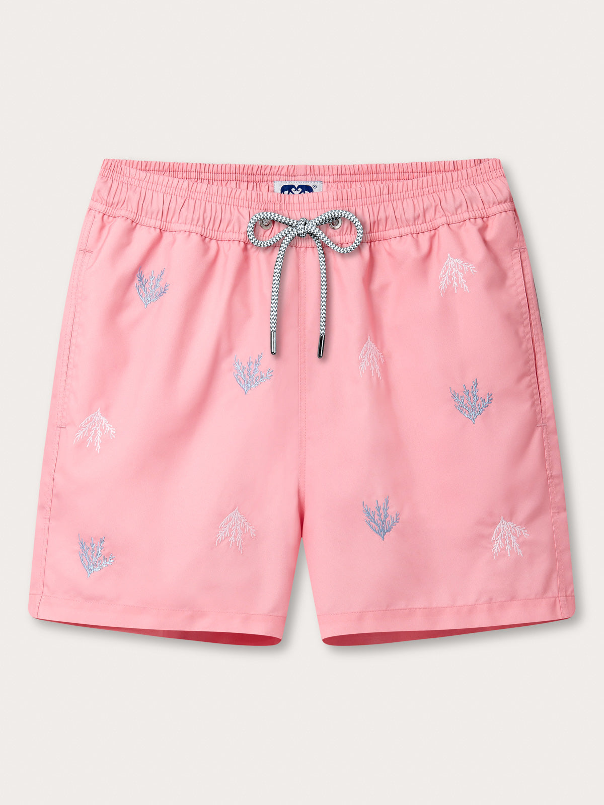 Pink shorts with a drawstring on a light gray background