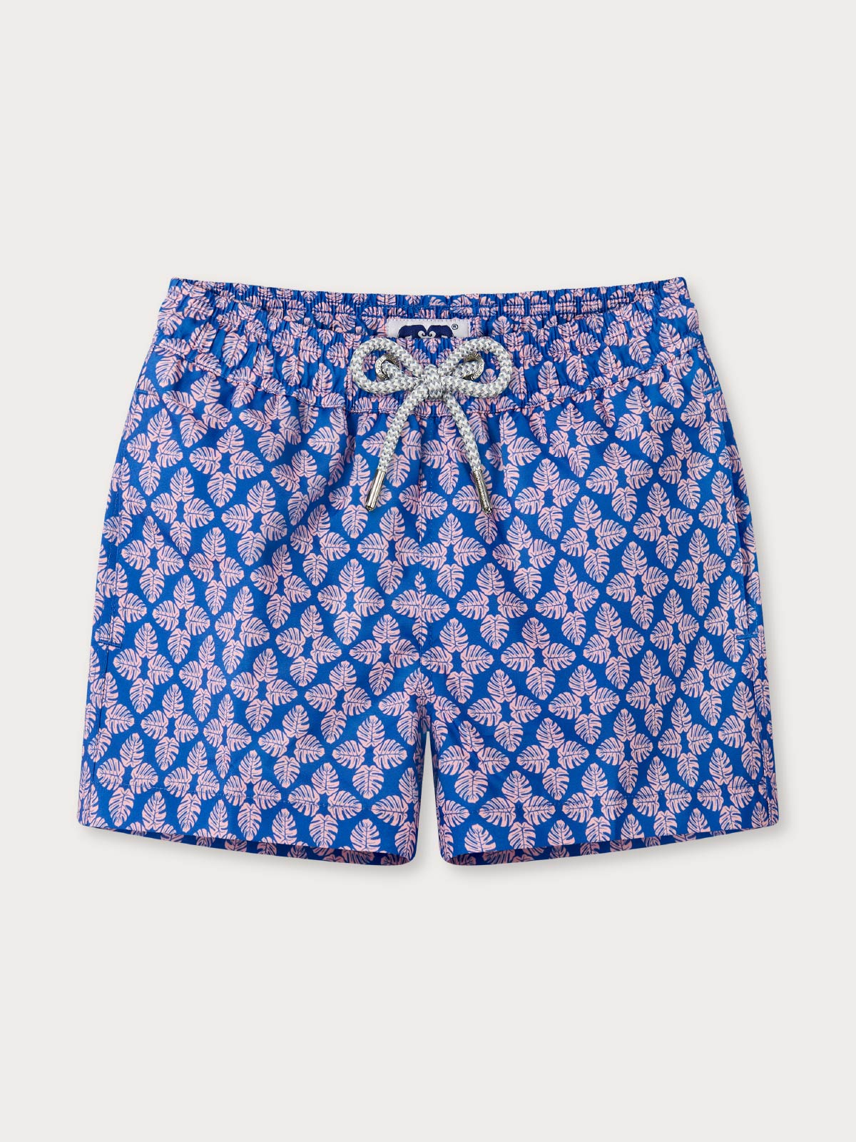 Blue swim shorts with pink leaf pattern with drawstring on a white background.