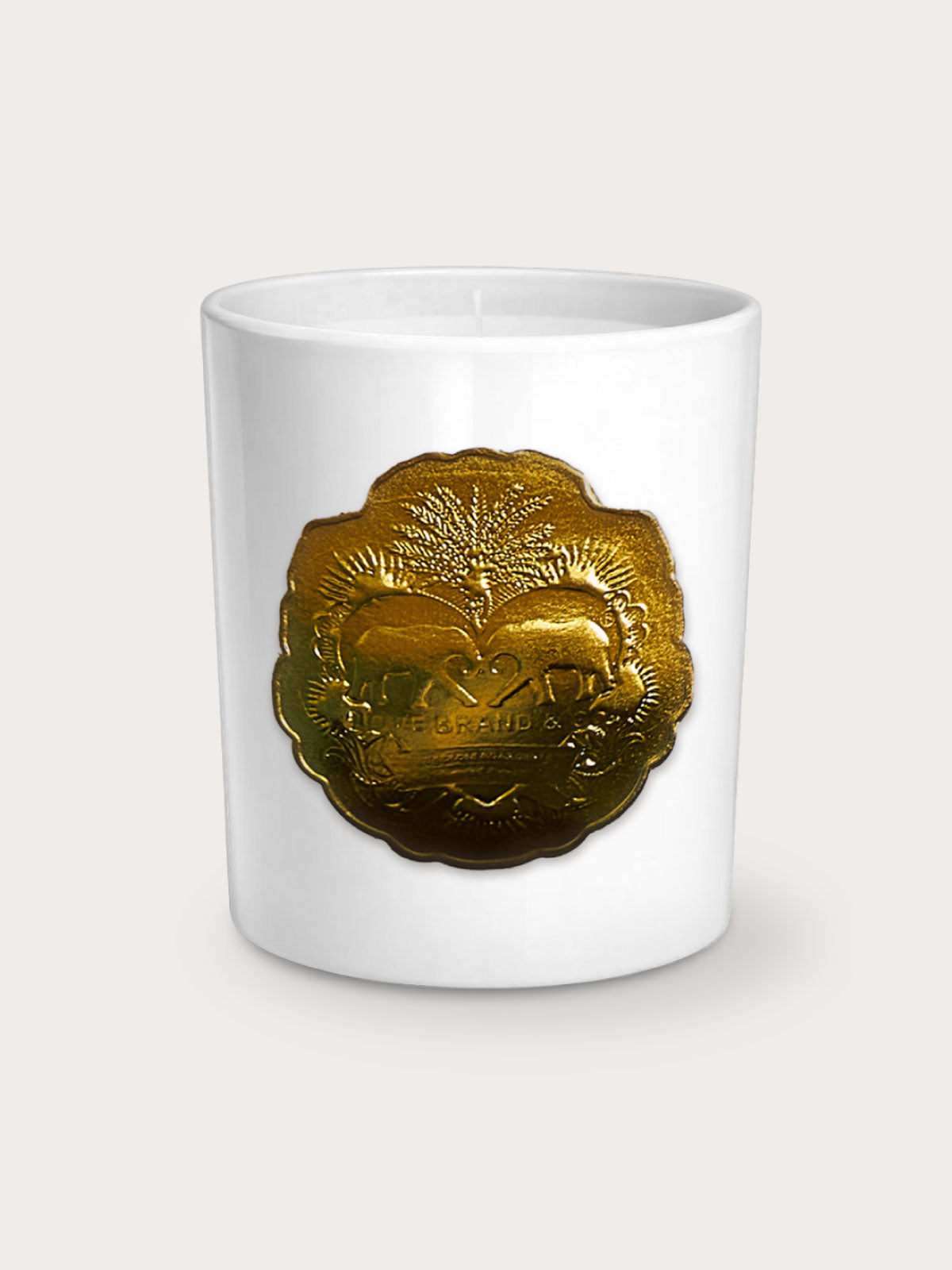 White Love Brand candle with a gold emblem on a white background