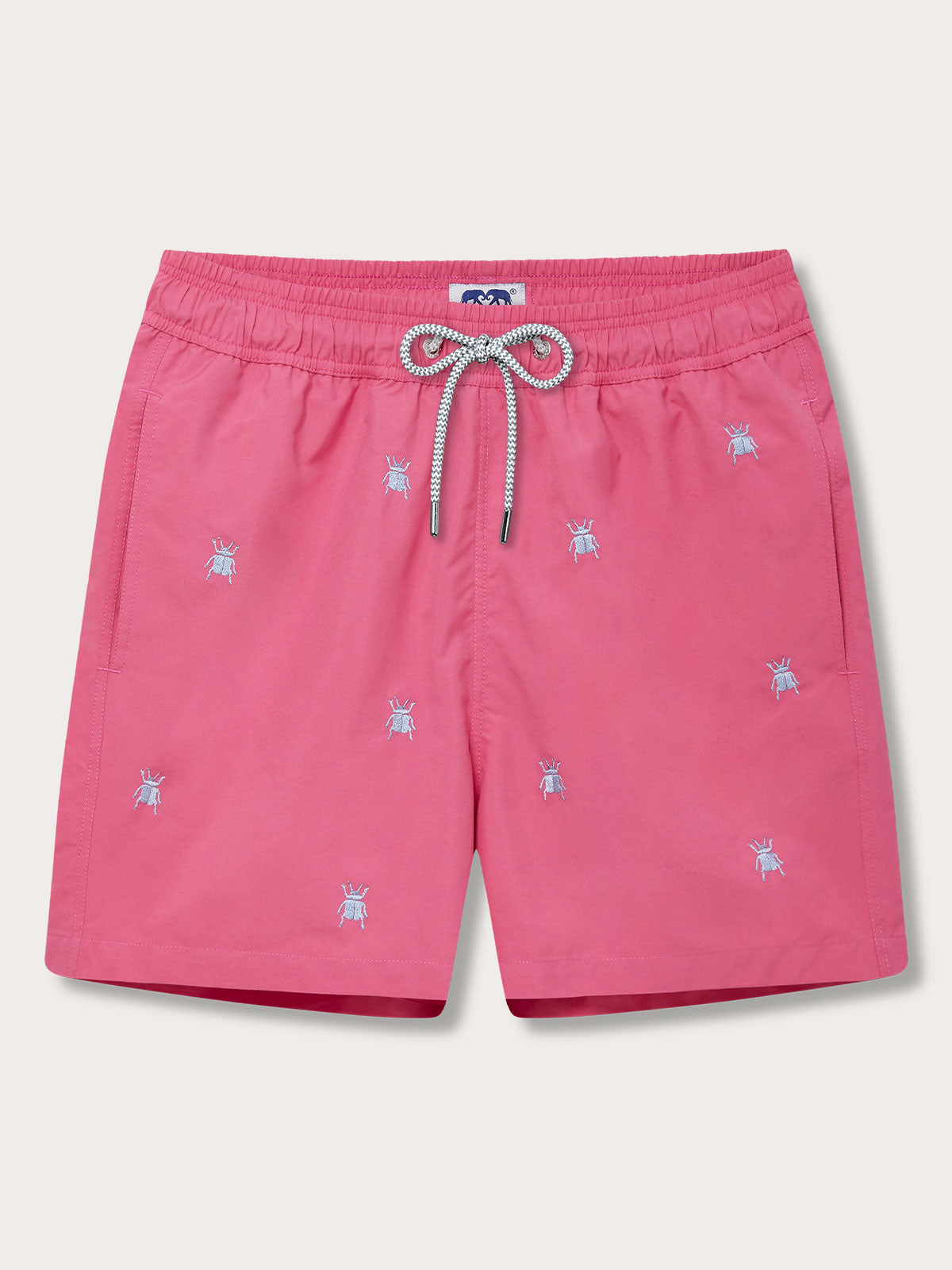 Men's Ruby Red swim shorts with embroidered tansy beetles pattern and a drawstring waist.