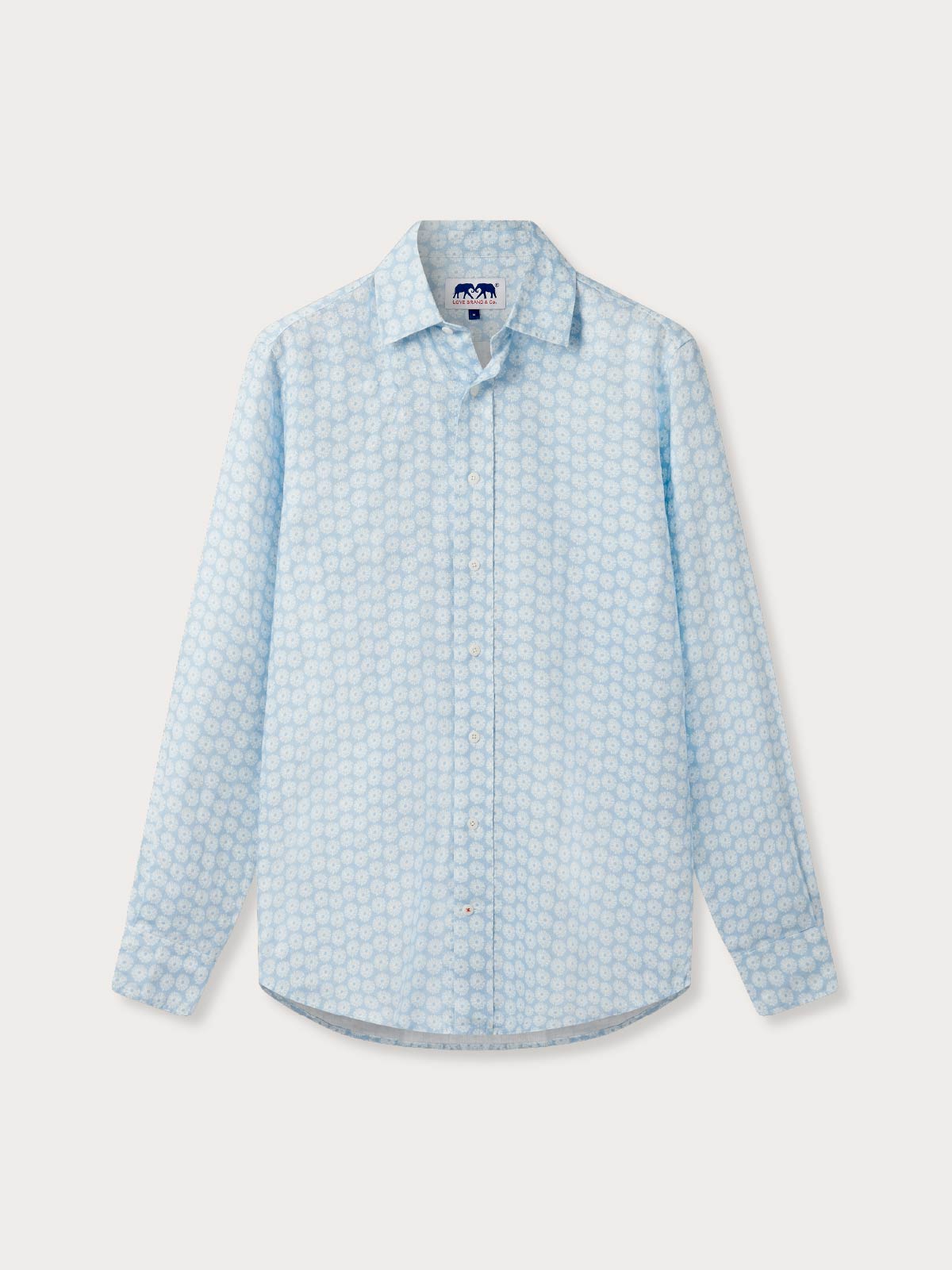 Light blue mens linen shirt with button up design and long sleeves.