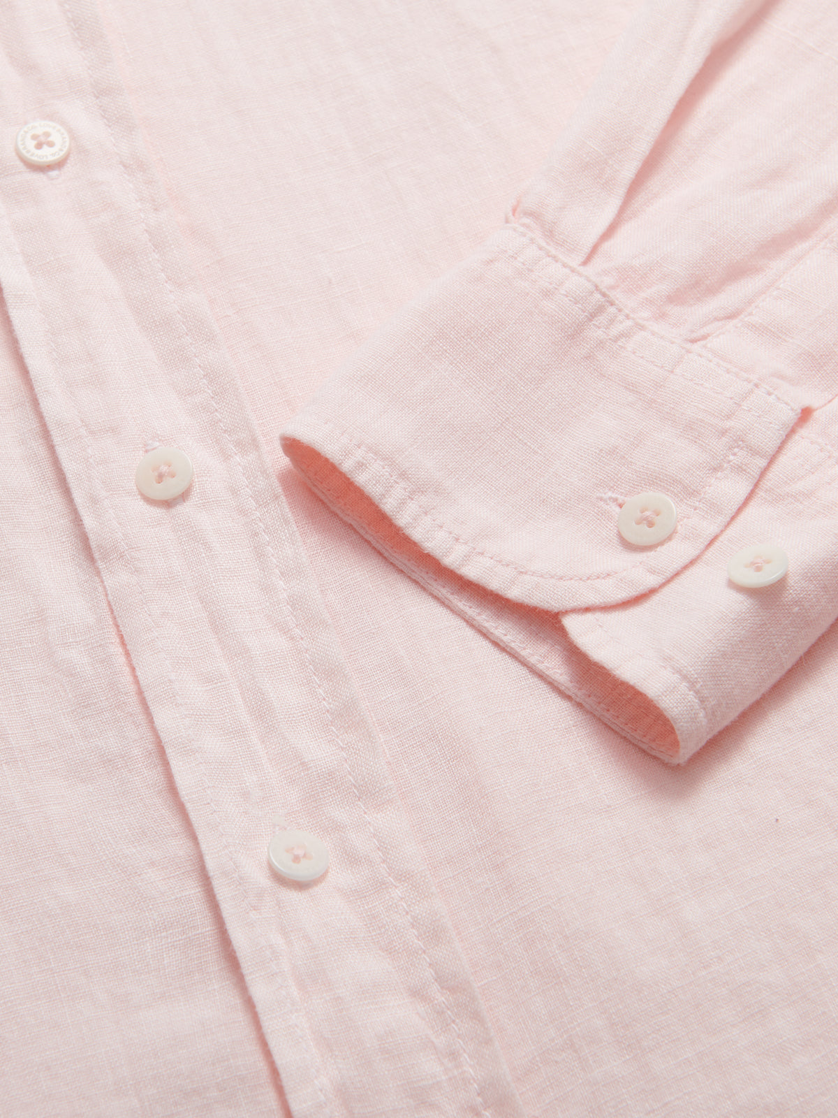 pastel pink linen shirt sleeves