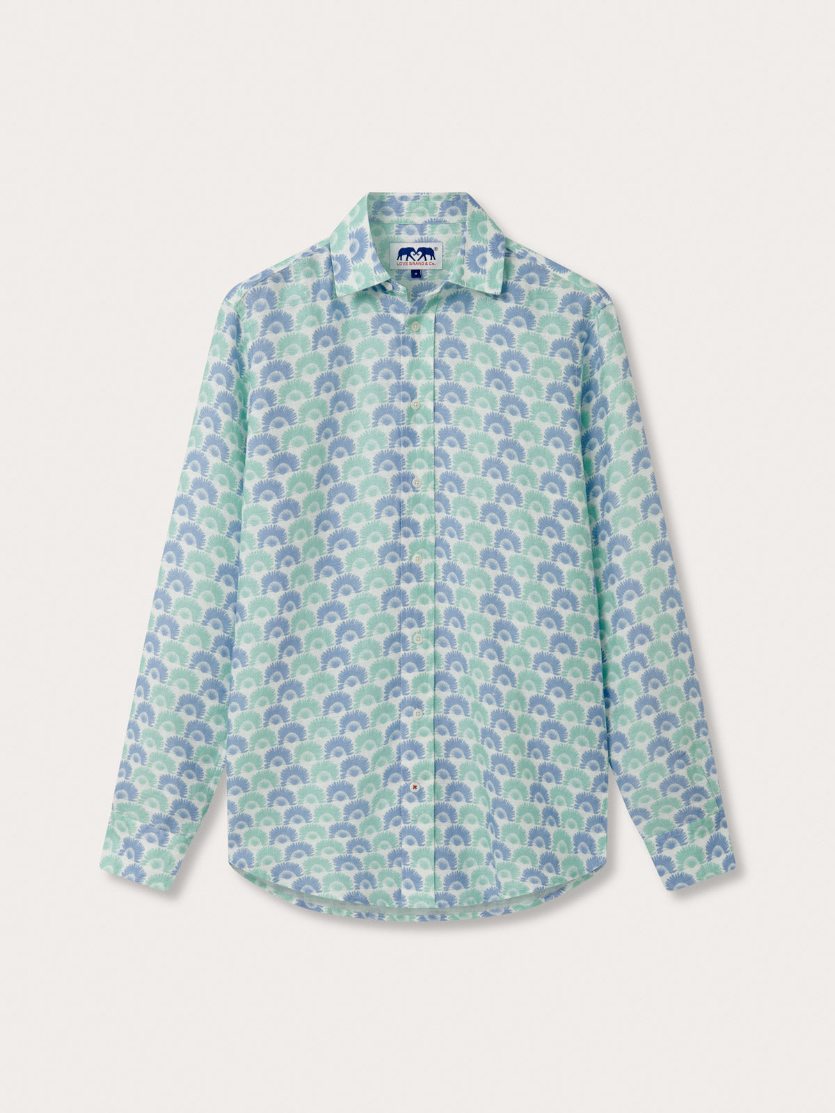 White shirt with blue and green floral pattern on a white background