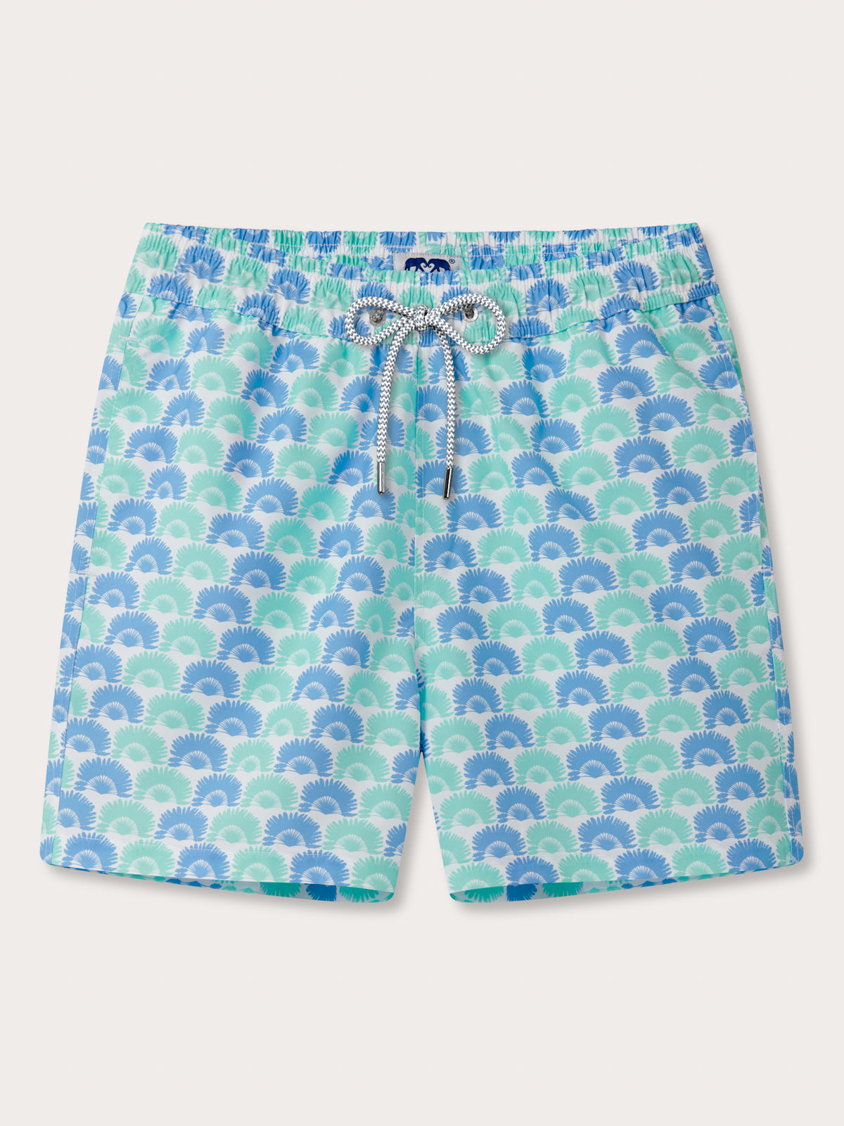 Blue and green patterned swim shorts on a white background