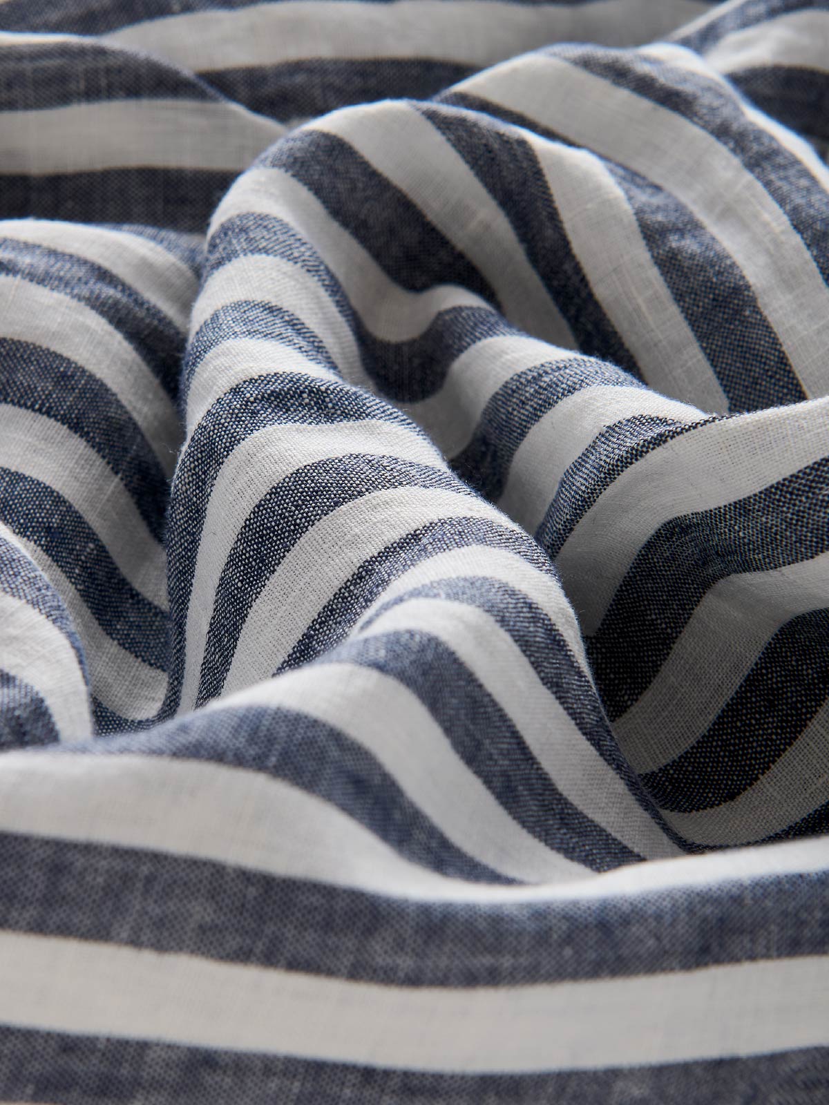 Close-up of blue and white striped linen fabric