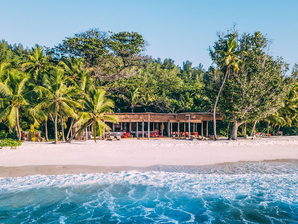 an ocean side bar at North Island Seychelles overlooking the sea