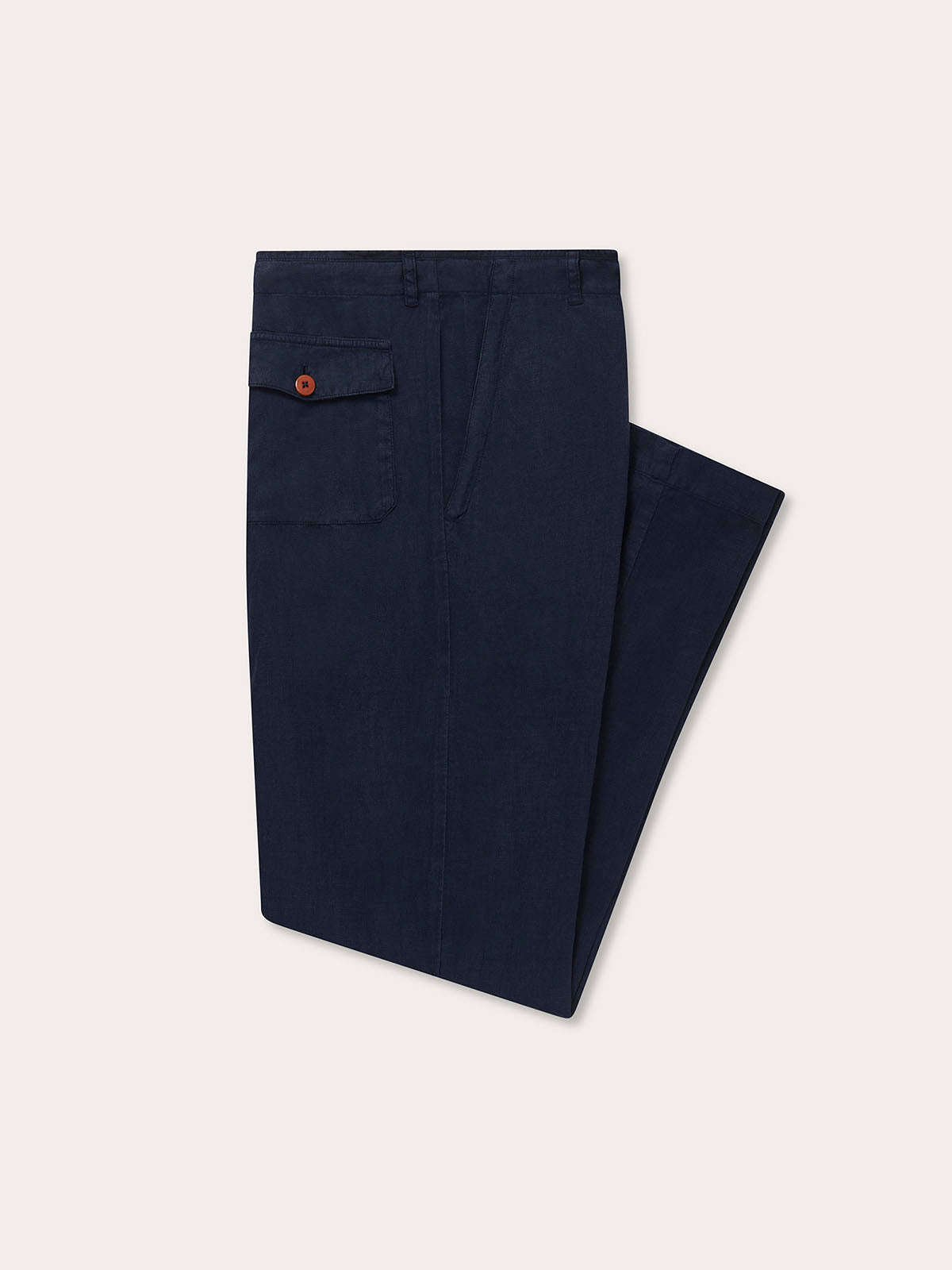 side view of love brand randall navy blue linen trousers. Old money men's style trousers showcasing front and back pockets.