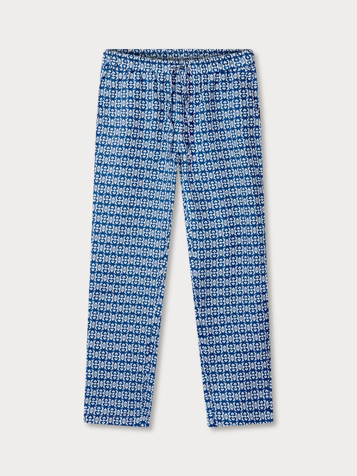mens blue linen trousers with drawstring waist and pockets in a seahorse geometric print.