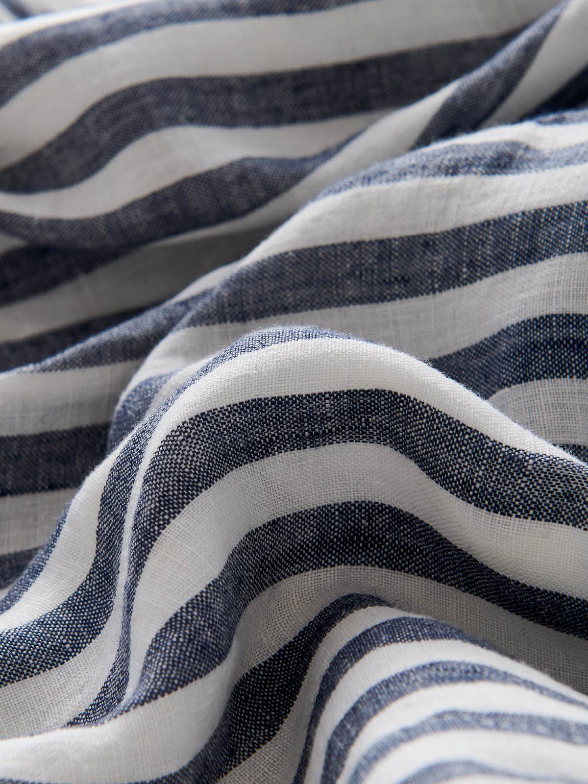 Close-up of striped navy shorts