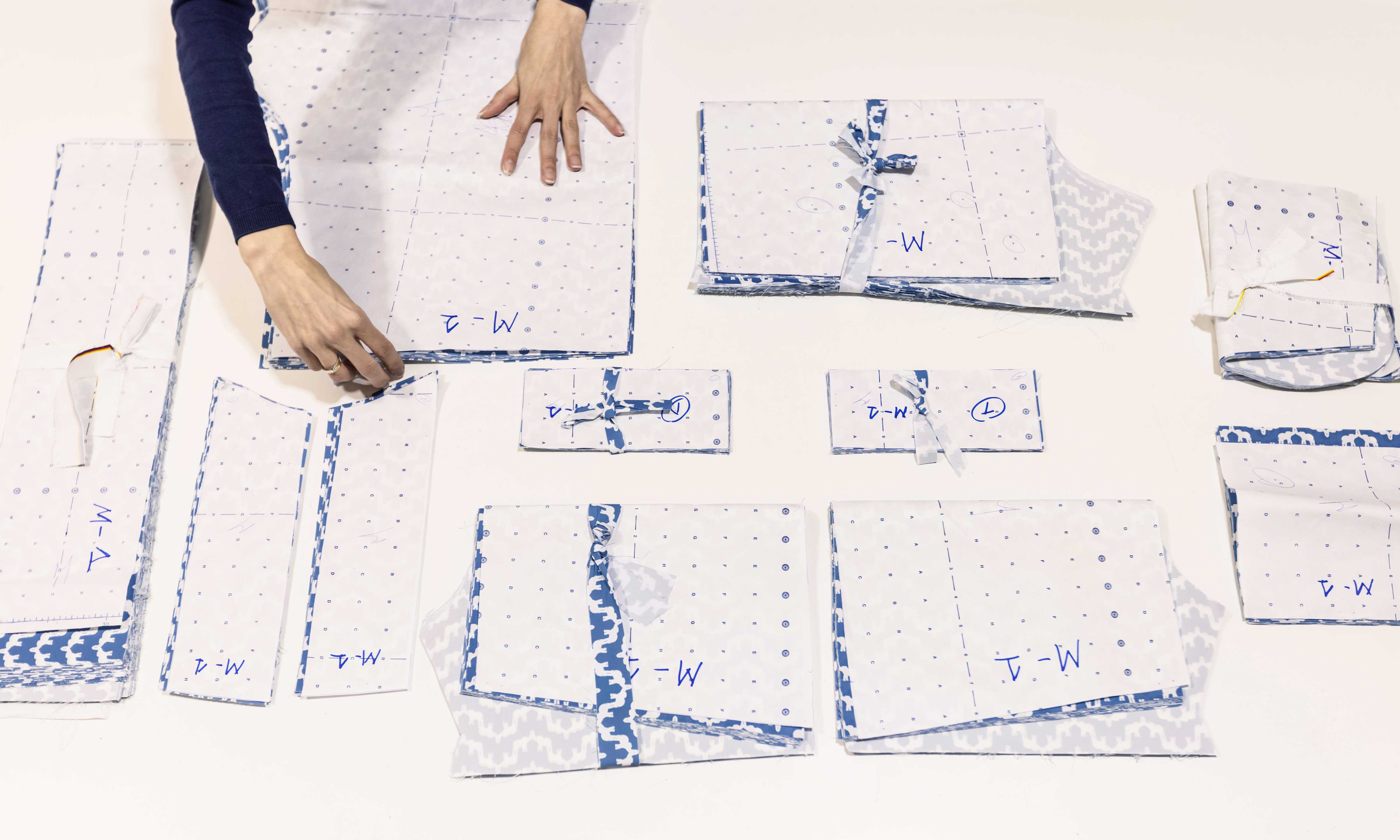 Collection of swimming trunk patterns with labels on a white background