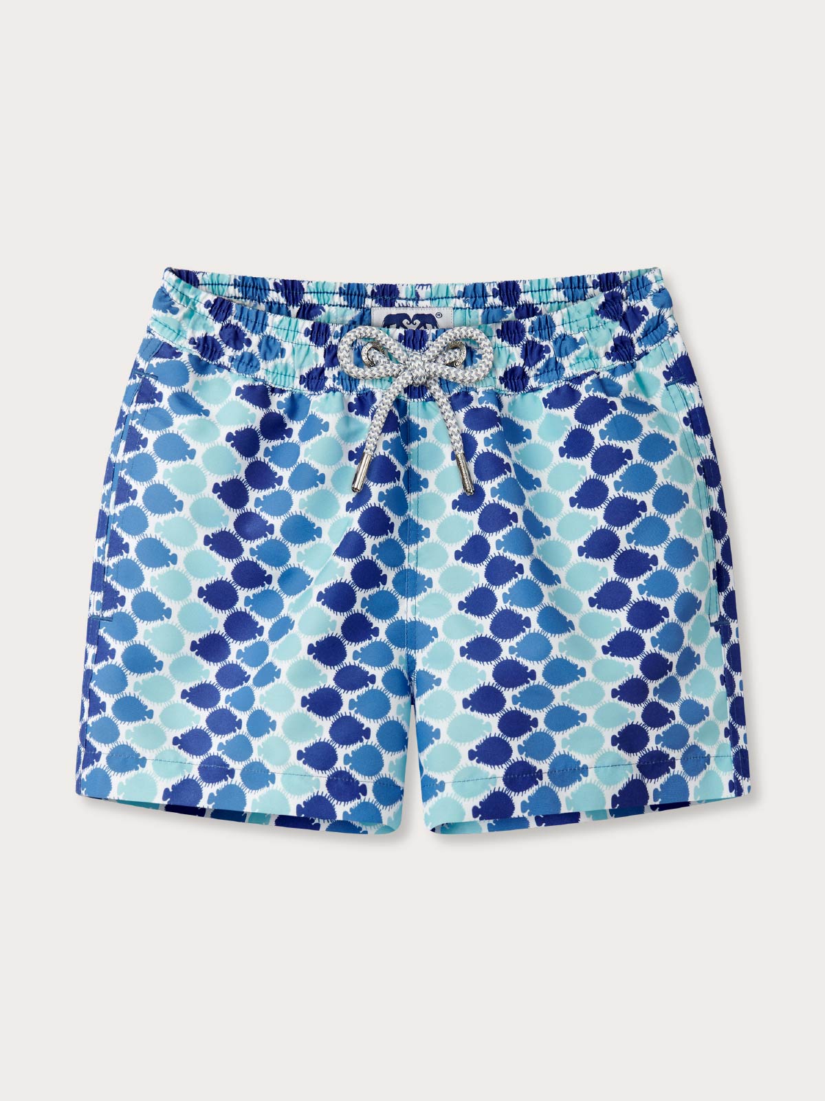 Kids blue swim shorts with a puffer fish print