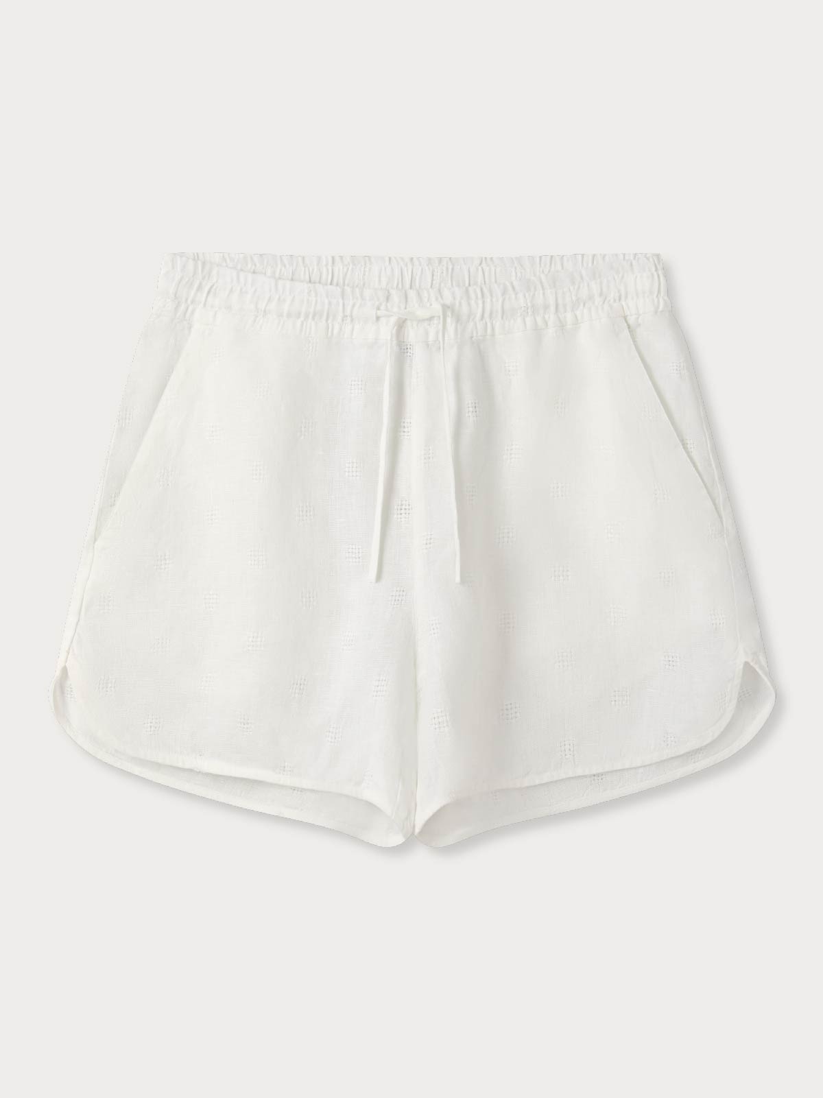 womens cream textured shorts with a drawstring.