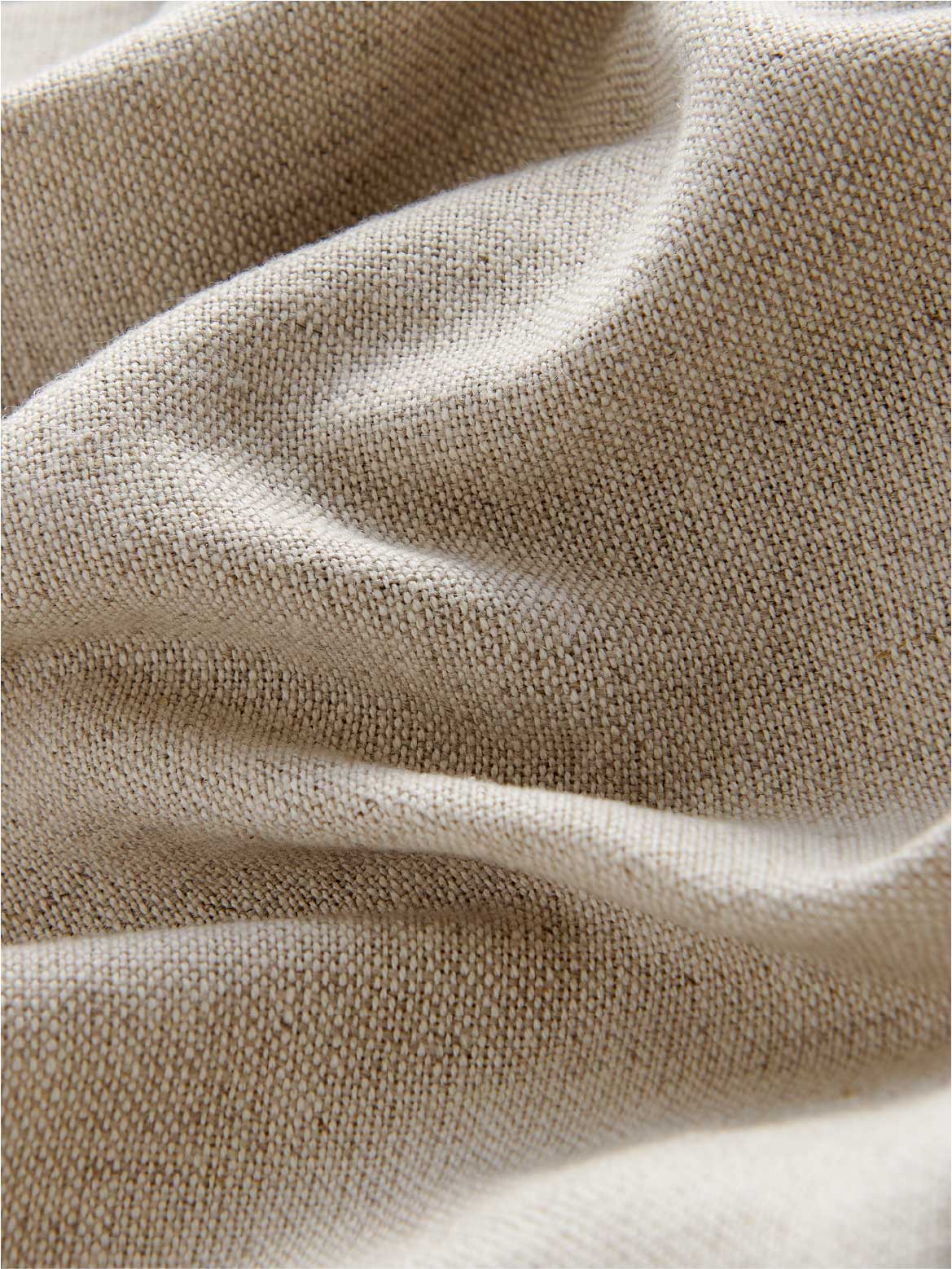 Close-up of beige linen fabric texture