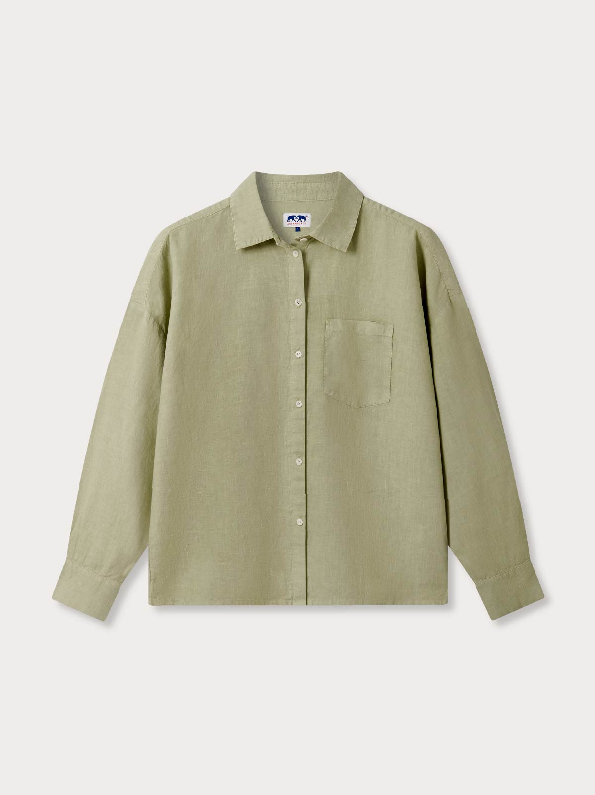 Green linen shirt for women with a collar on a light grey background