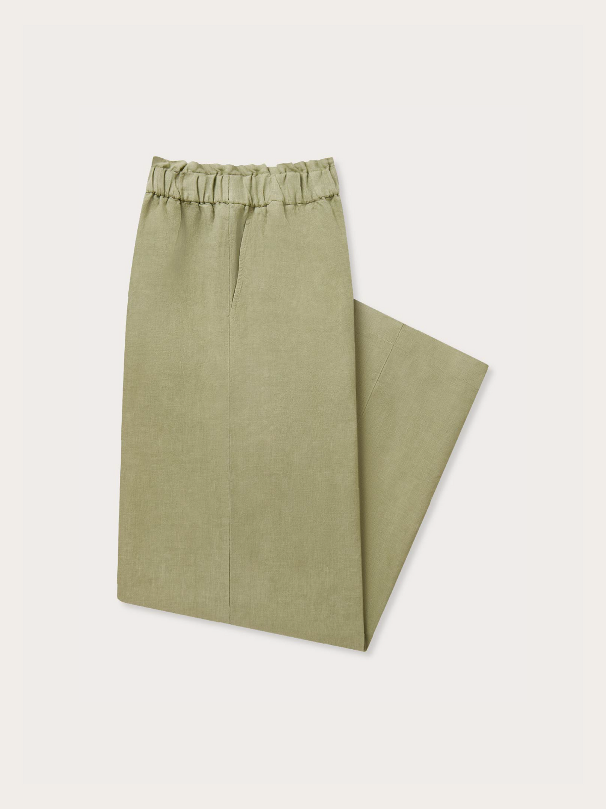 womens green linen trousers shown from the side folded in half