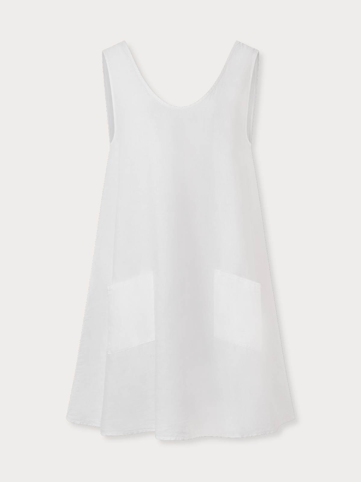 White sleeveless dress on a light grey background.