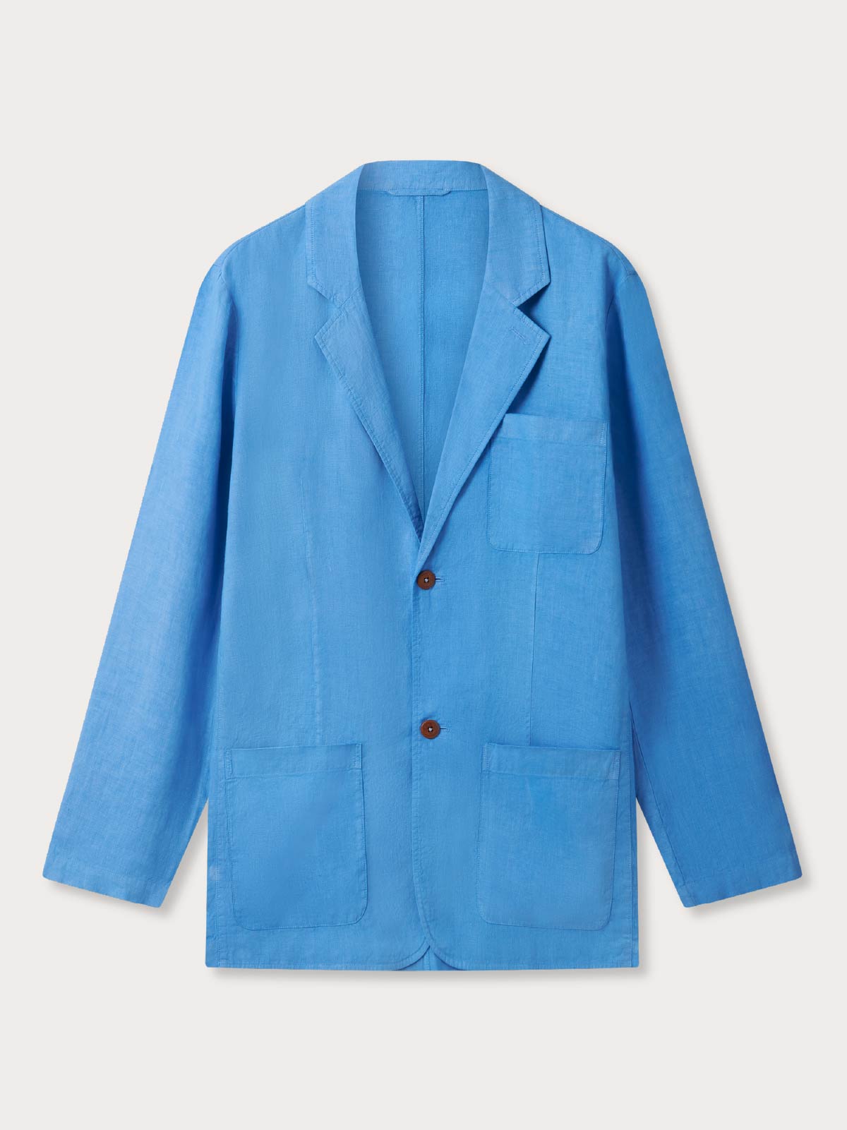 Blue blazer with three front pockets on a light grey background.