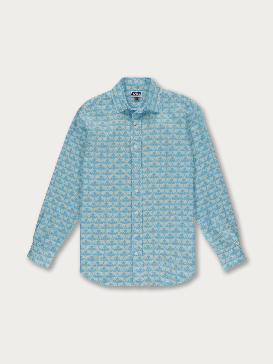 A long-sleeve men's shirt with a white and blue elephant pattern on a light blue background.