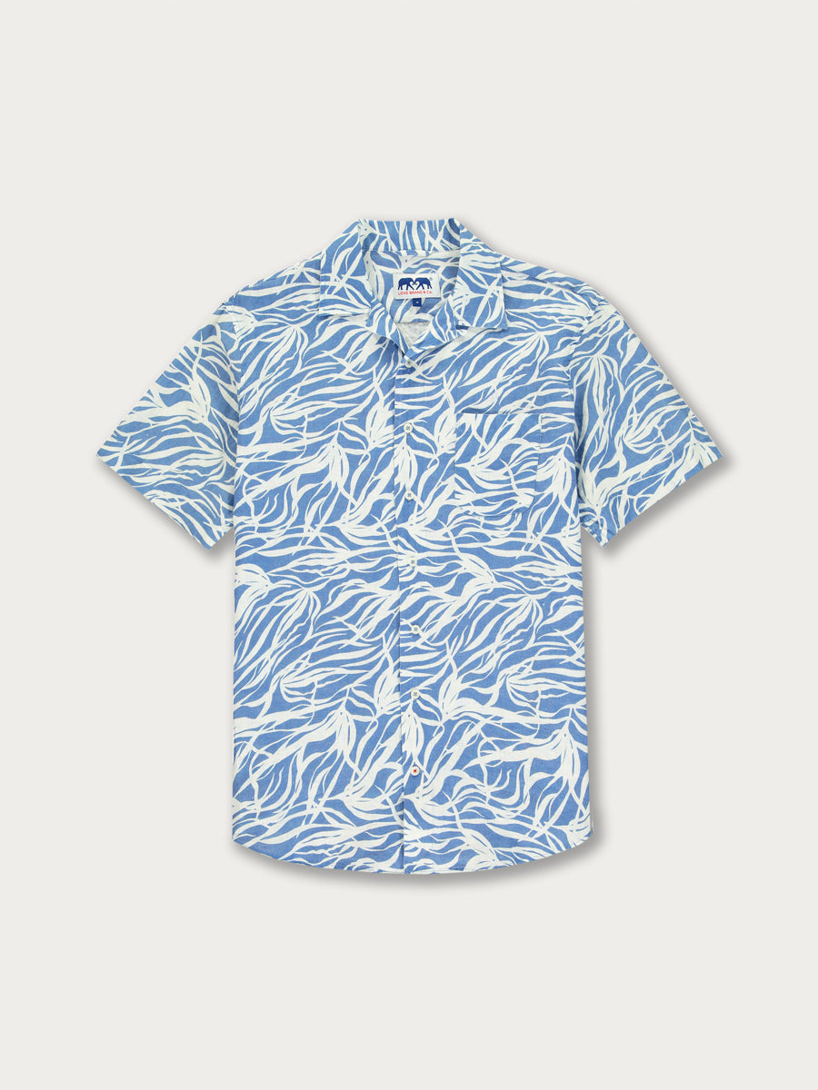 Men's Kelp Arawak Linen Shirt in sea blue and white. Men's linen shirt with an elegant print inspired by underwater kelp forests.