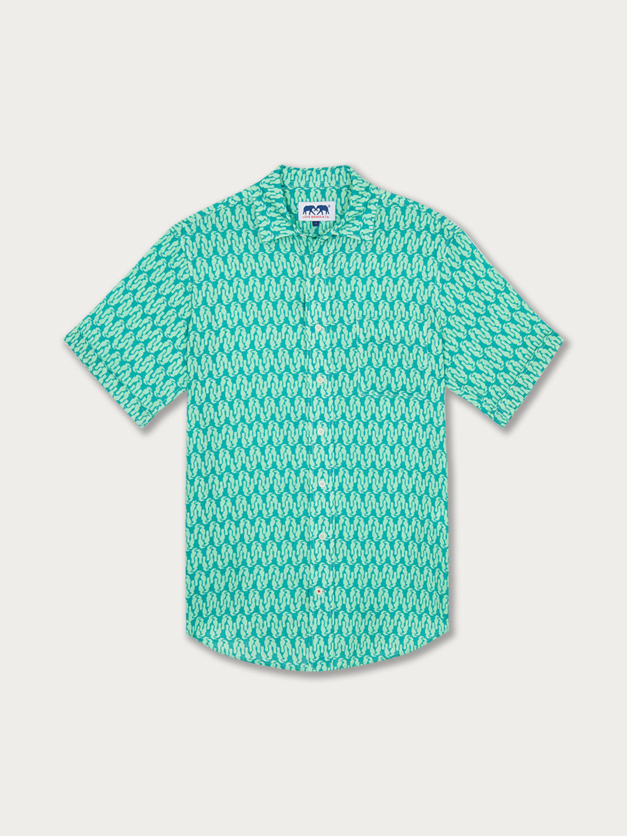 Men's King of the Jungle Manjack Linen Shirt featuring a short-sleeved, button-down design. Men's linen shirt with a green graphic print pattern.