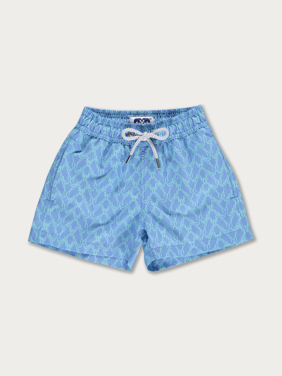 Boys Posidonia y el Mar Staniel Swim Shorts in light blue with a seagrass-inspired pattern and a white drawstring.