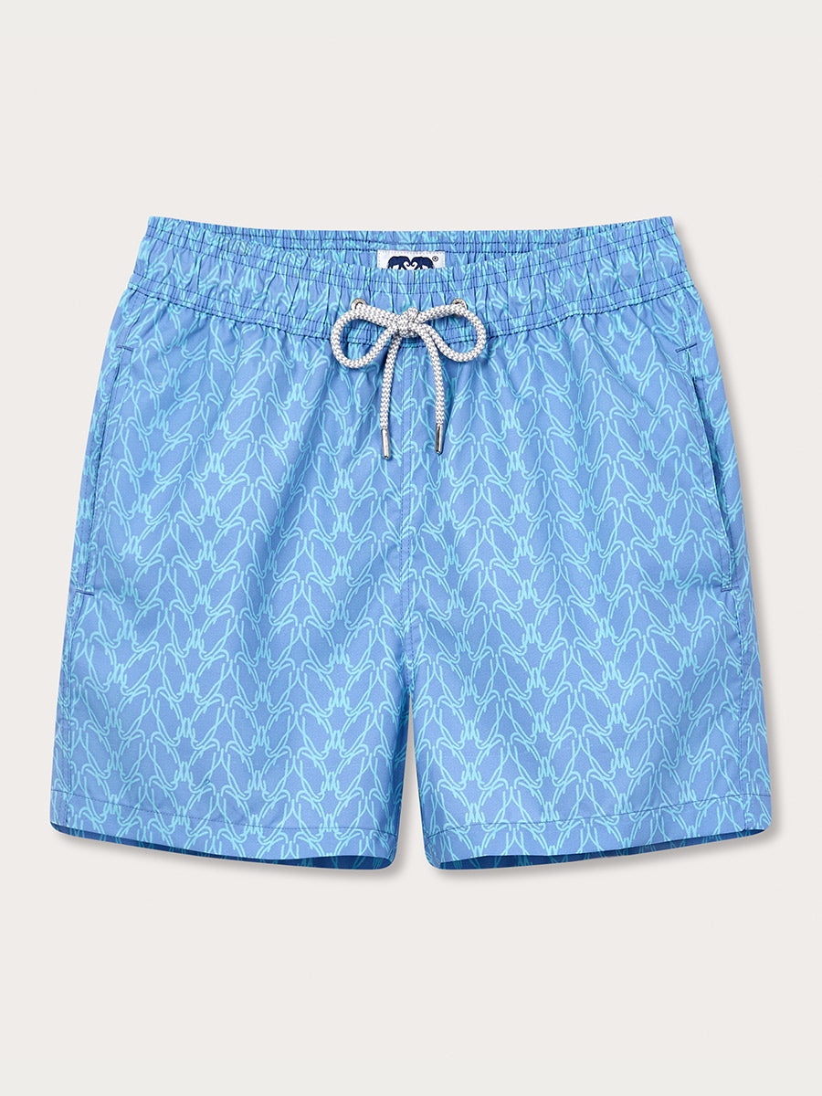 Men's Posidonia y el Mar Staniel Swim Shorts in a light blue color with an intricate seaweed pattern.