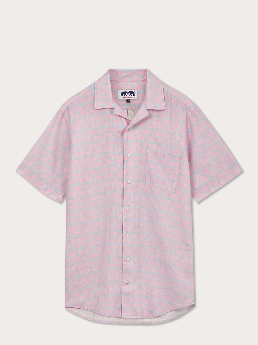 Men's Sea Scallops Arawak Linen Shirt with a geometric pastel pink and blue scallop print. Men's linen shirt made from 100% linen, with short-sleeved, and designed for comfort and style.