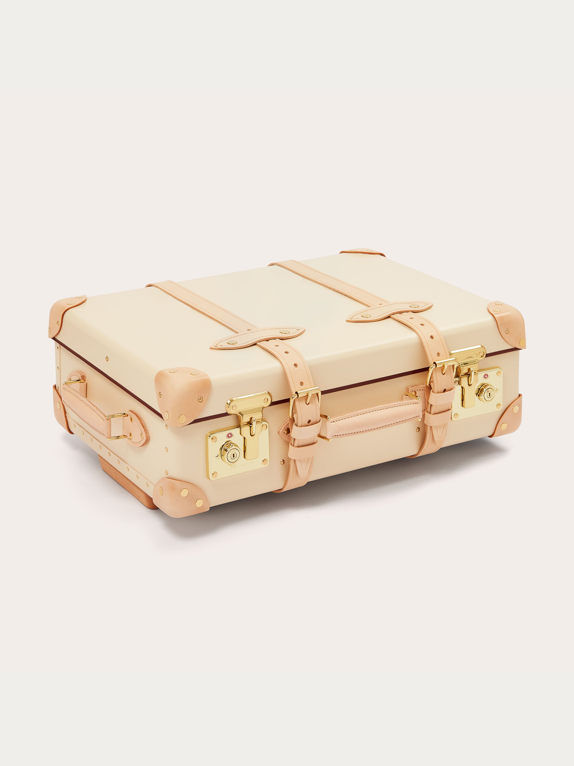 Globe-Trotter Safari 20" Trolley Case in beige with tan leather straps and gold hardware.