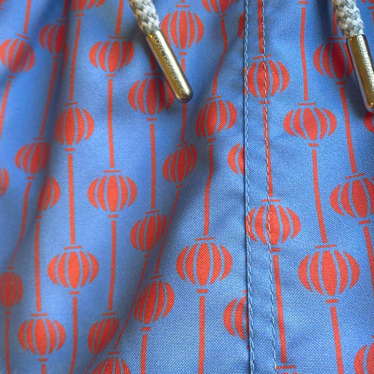 red and blue swim shorts