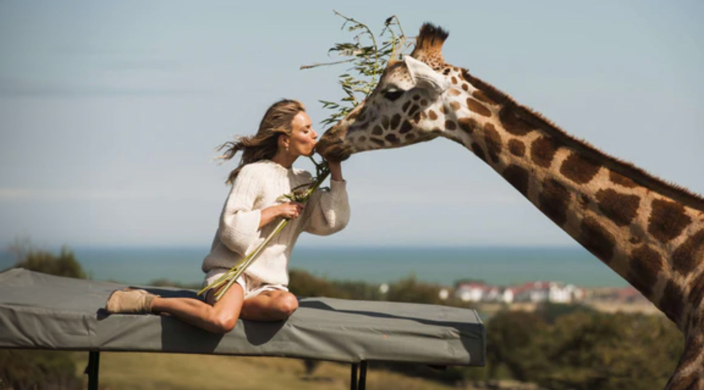 Victoria Aspinall with giraffe