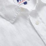 Close-up view of Abaco Mens White Linen Shirt. Detailed view of the label of this mens linen shirt.