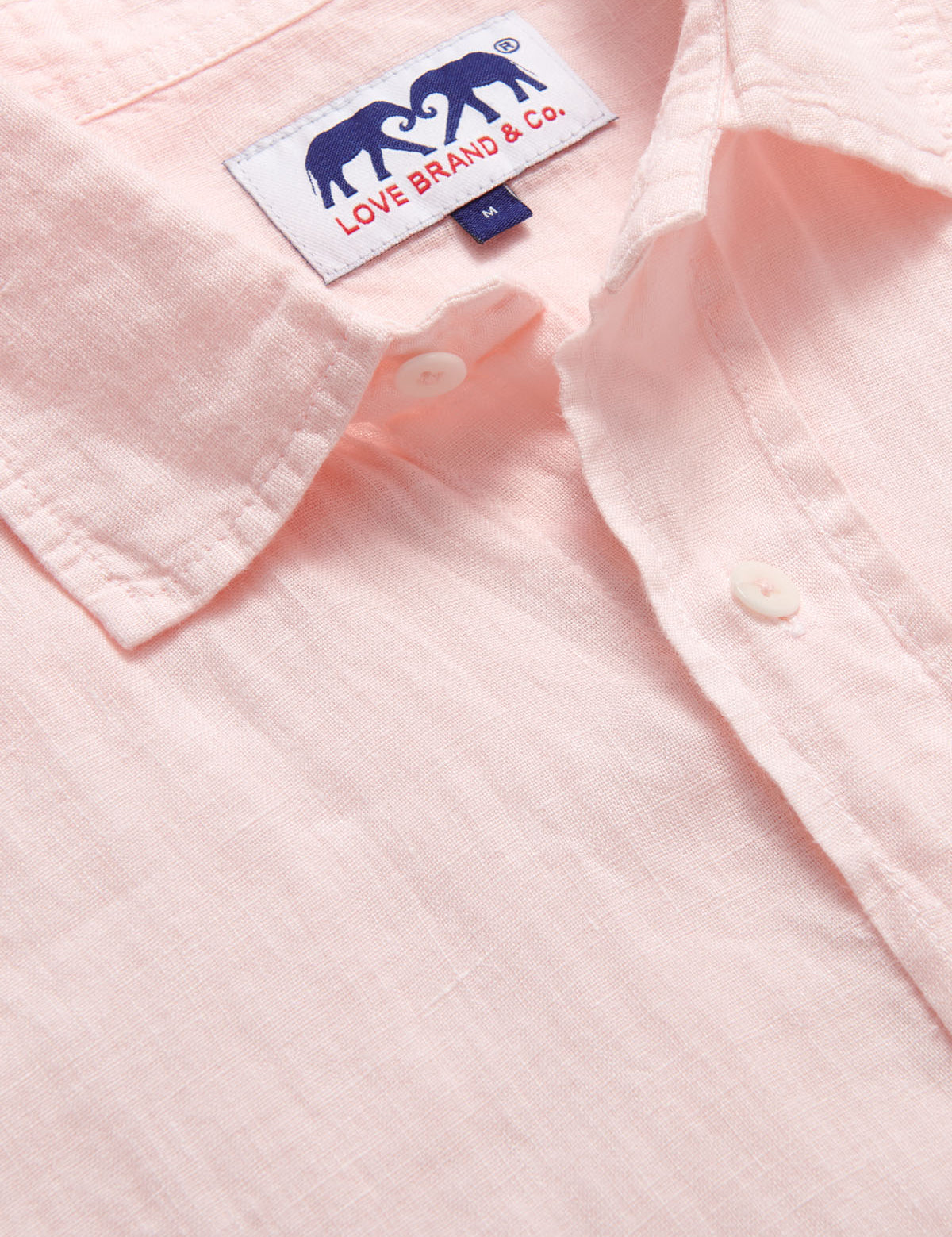 Abaco Pastel Pink mens Linen Shirt detailed view showing pastel pink colour and Love Brand & Co logo.