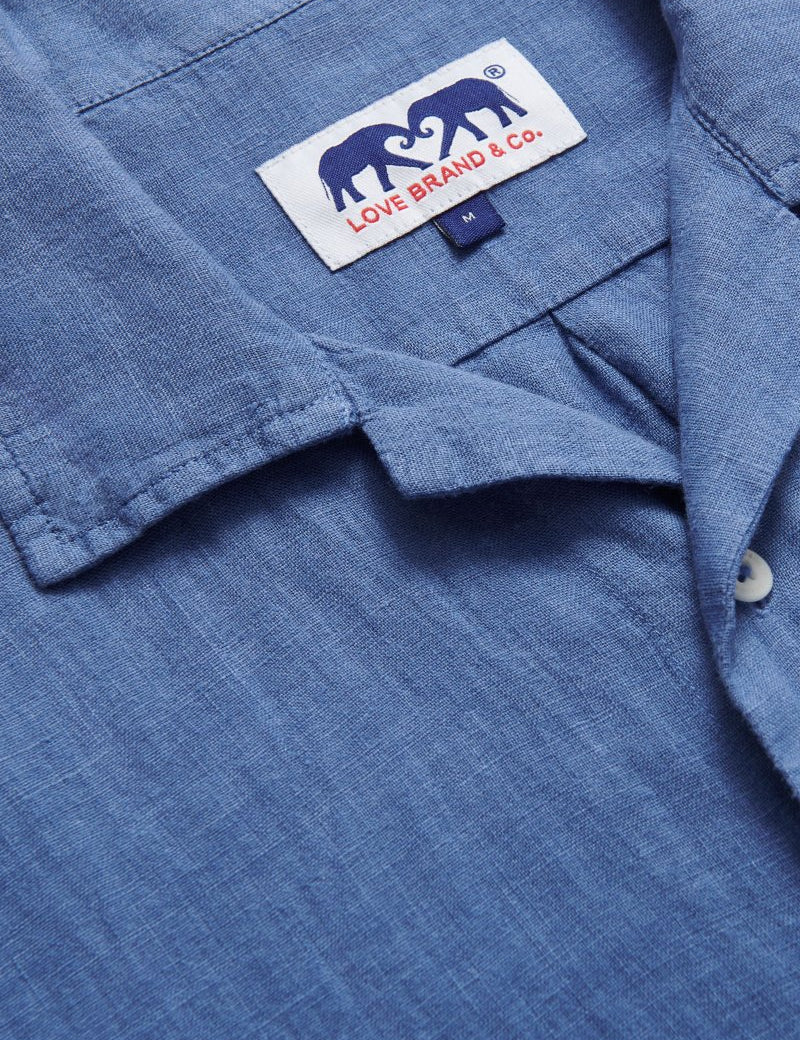 Arawak Deep Blue mens Linen Shirt close-up showing love brand logo label.