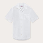 Front view of Love Brand Arawak Mens White Linen Shirt. Short-sleeved white shirt with front pocket and camp collar.