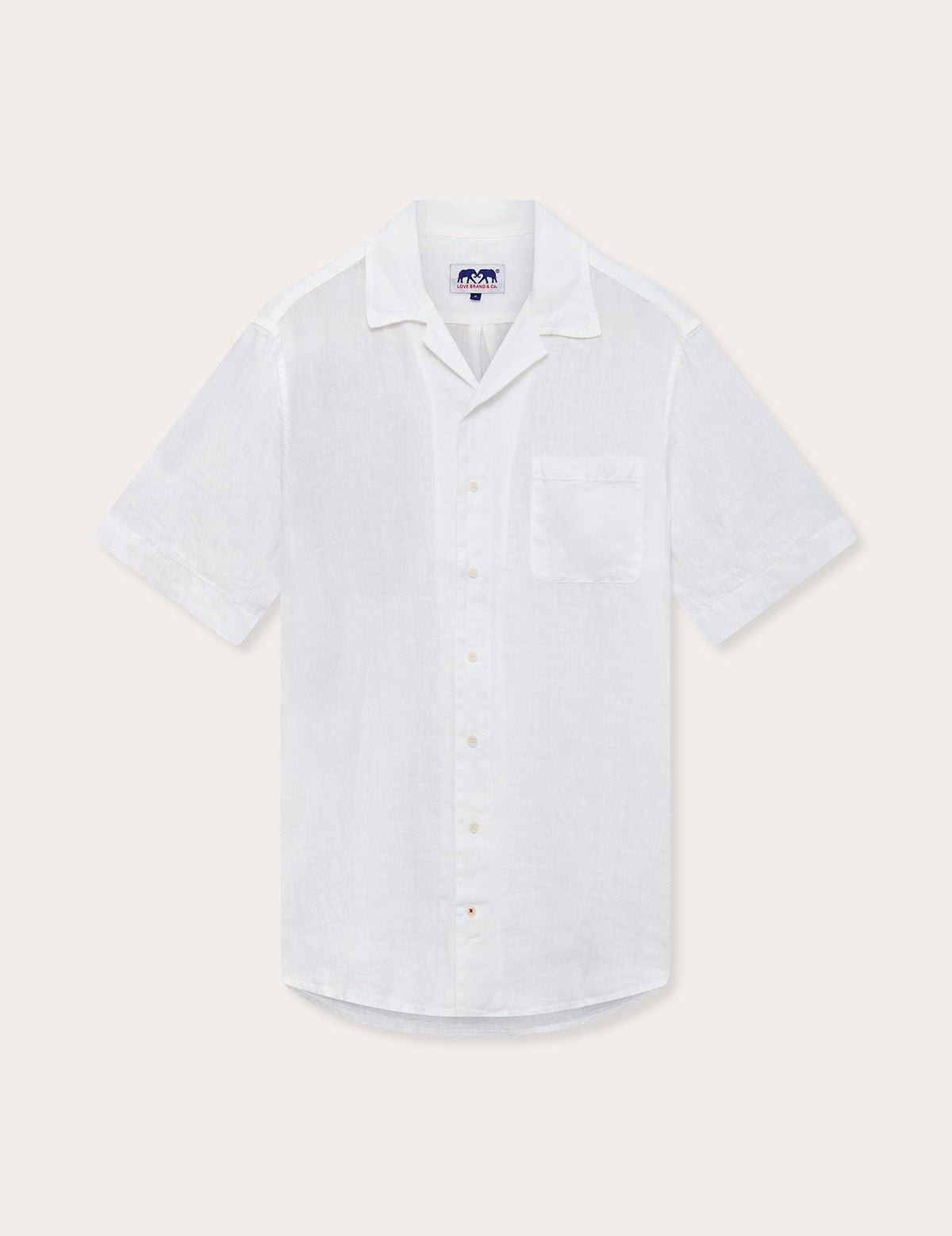 Front view of Love Brand Arawak Mens White Linen Shirt. Short-sleeved white shirt with front pocket and camp collar.