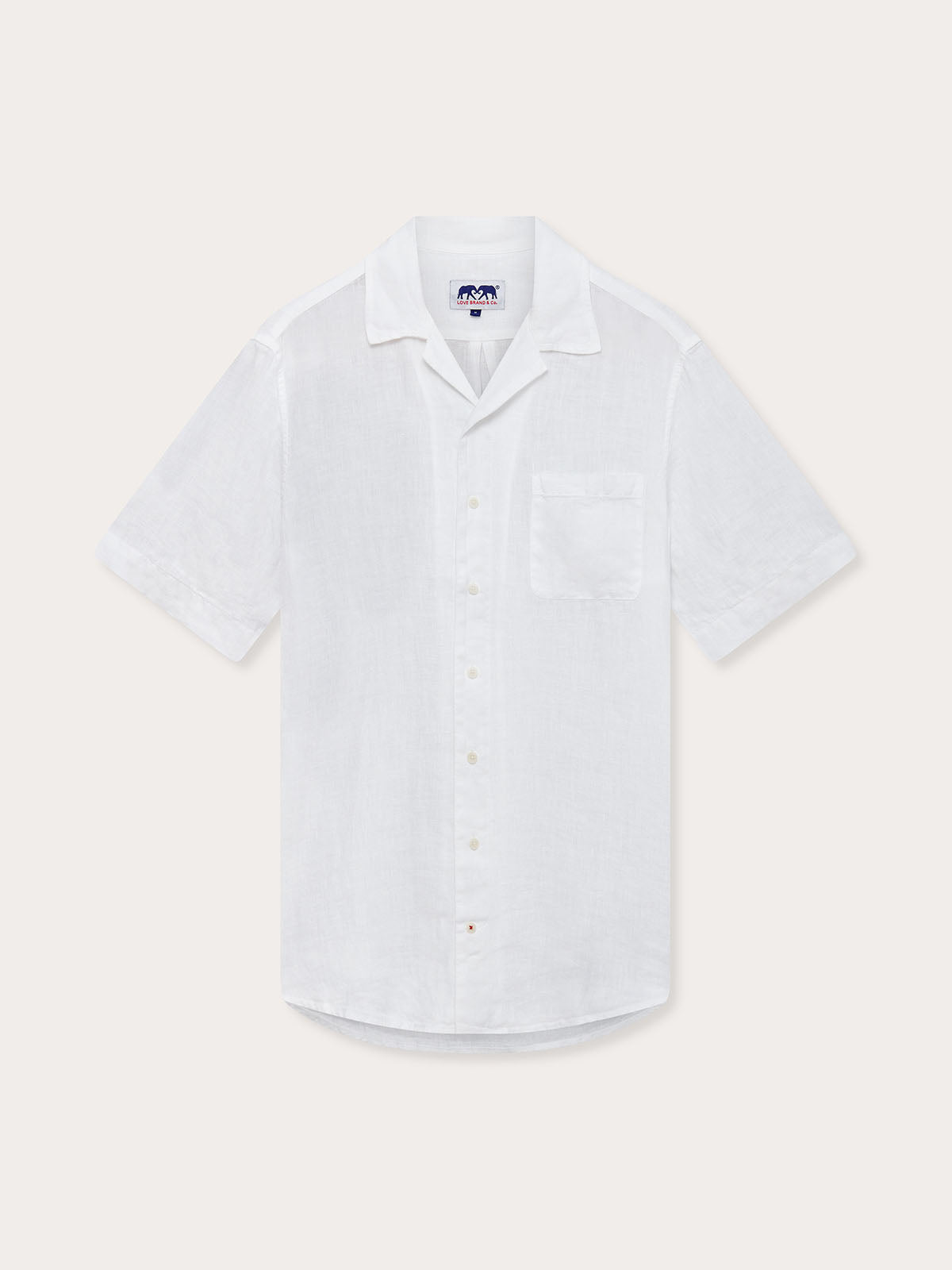 Front view of Love Brand Arawak Mens White Linen Shirt. Short-sleeved white shirt with front pocket and camp collar.