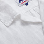 close-up view of Arawak Mens White Linen Shirt showing love brand logo label.