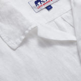 close-up view of Arawak Mens White Linen Shirt showing love brand logo label.