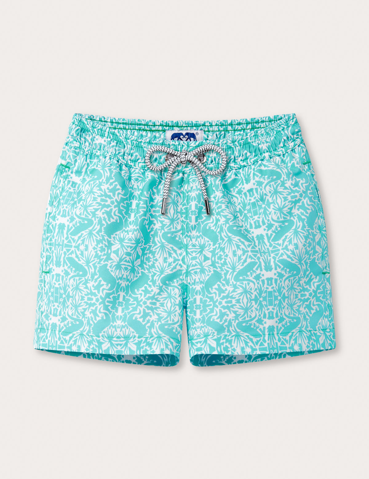 Boys Island Iguana Staniel Swim Shorts with green iguana pattern, Palm Beach-inspired poolside design featuring palm fragments.