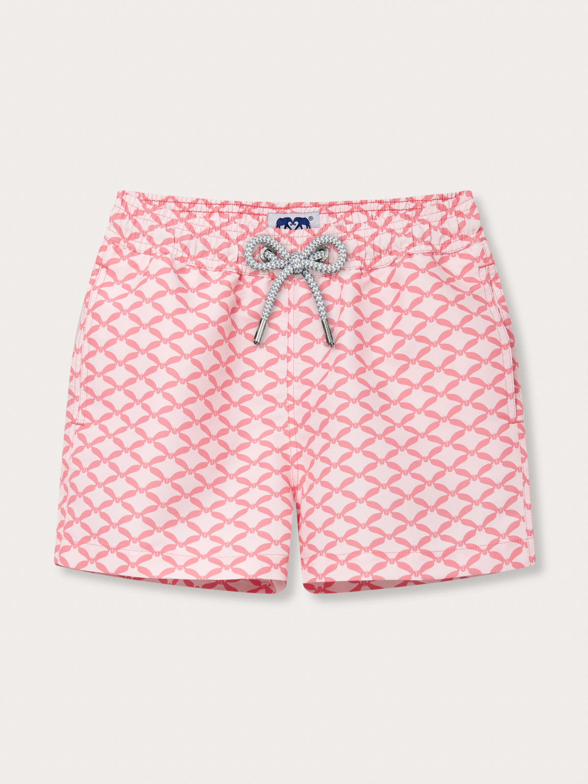 Boys Ray Rhythm Staniel Swim Shorts with diamond geometric print of manta rays in watermelon and light pink.
